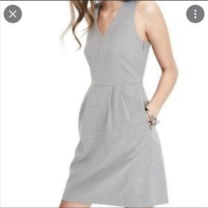 Beautiful dress only worn a few times. Has pockets and a cute back bow